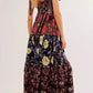 Floral tiered maxi dress back view with vibrant mixed print