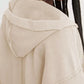 Exposed Seam Dropped Shoulder Hoodie in beige with frayed hem
