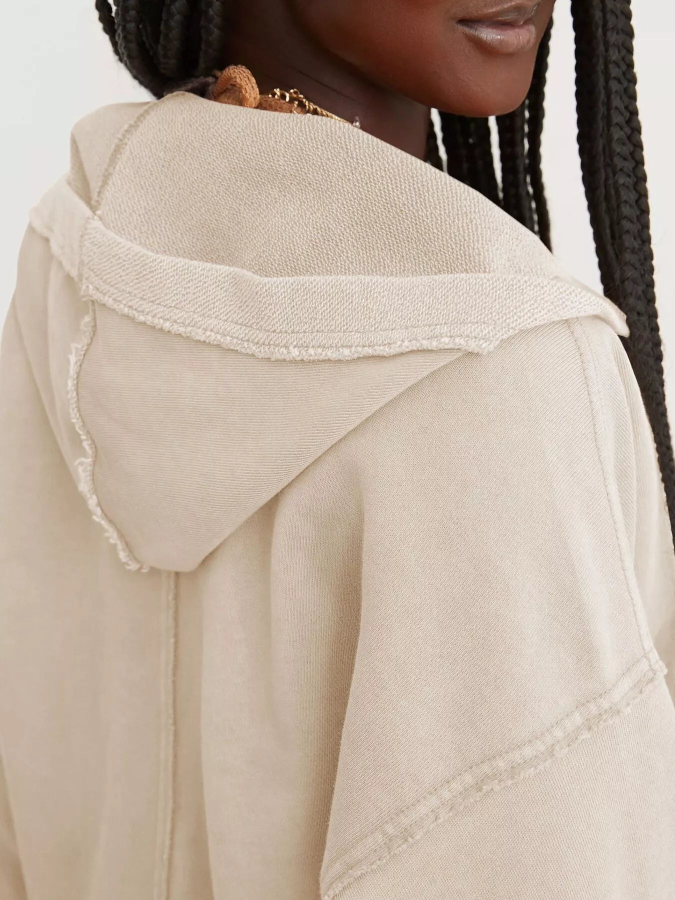 Exposed Seam Dropped Shoulder Hoodie in beige with frayed hem