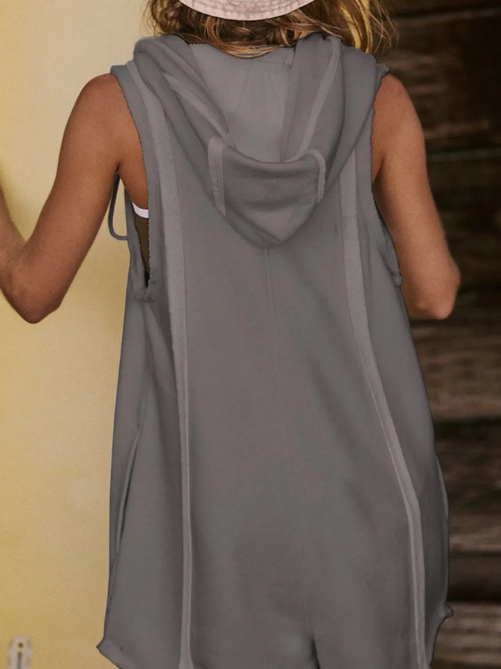 Gray sleeveless half-zipped hooded romper dress back view