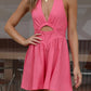 Daverri cutout halter neck mini dress in vibrant pink