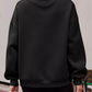 Black oversized mock neck dropped shoulder sweatshirt with ribbed cuffs and hem