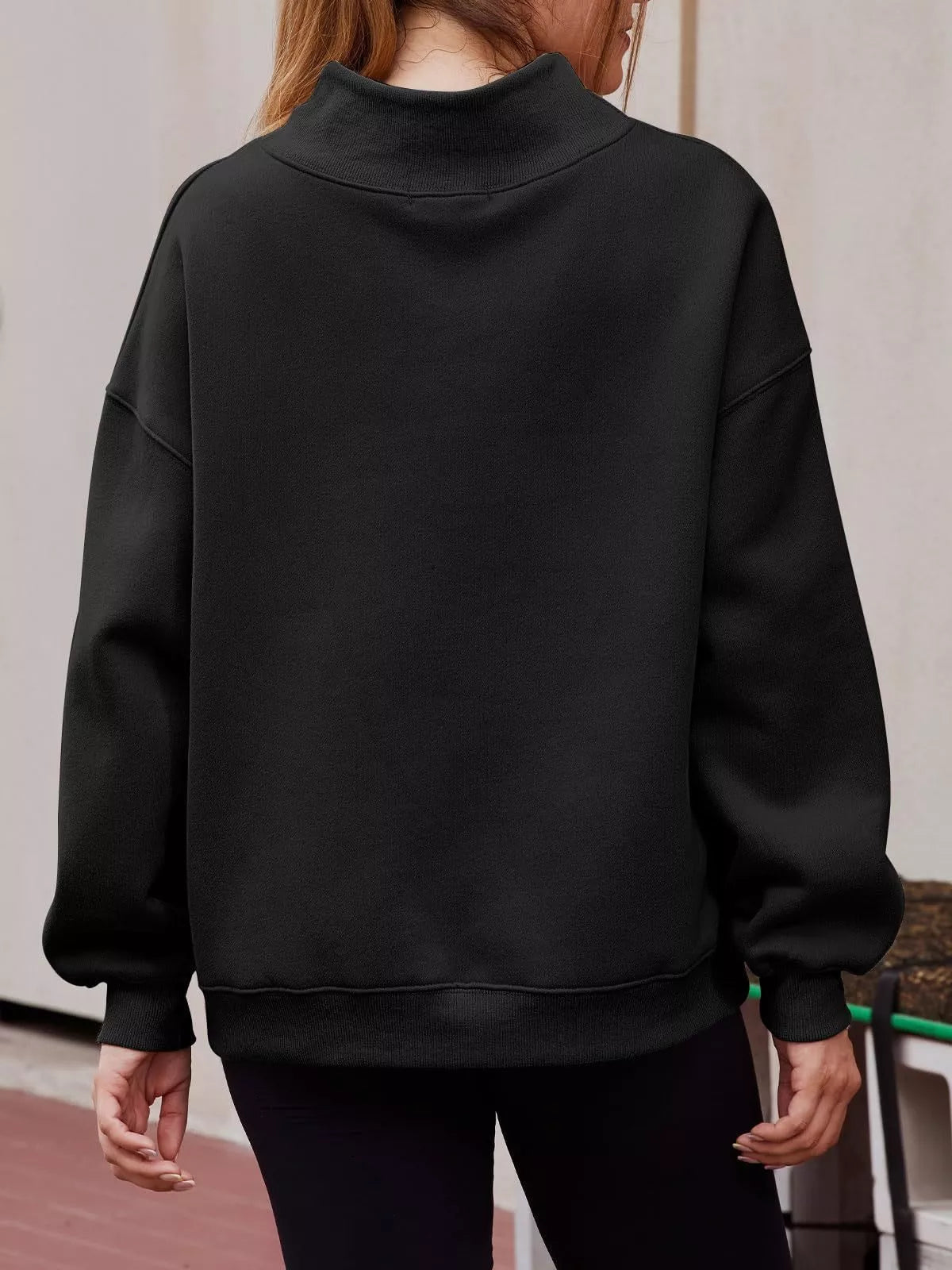 Black oversized mock neck dropped shoulder sweatshirt with ribbed cuffs and hem