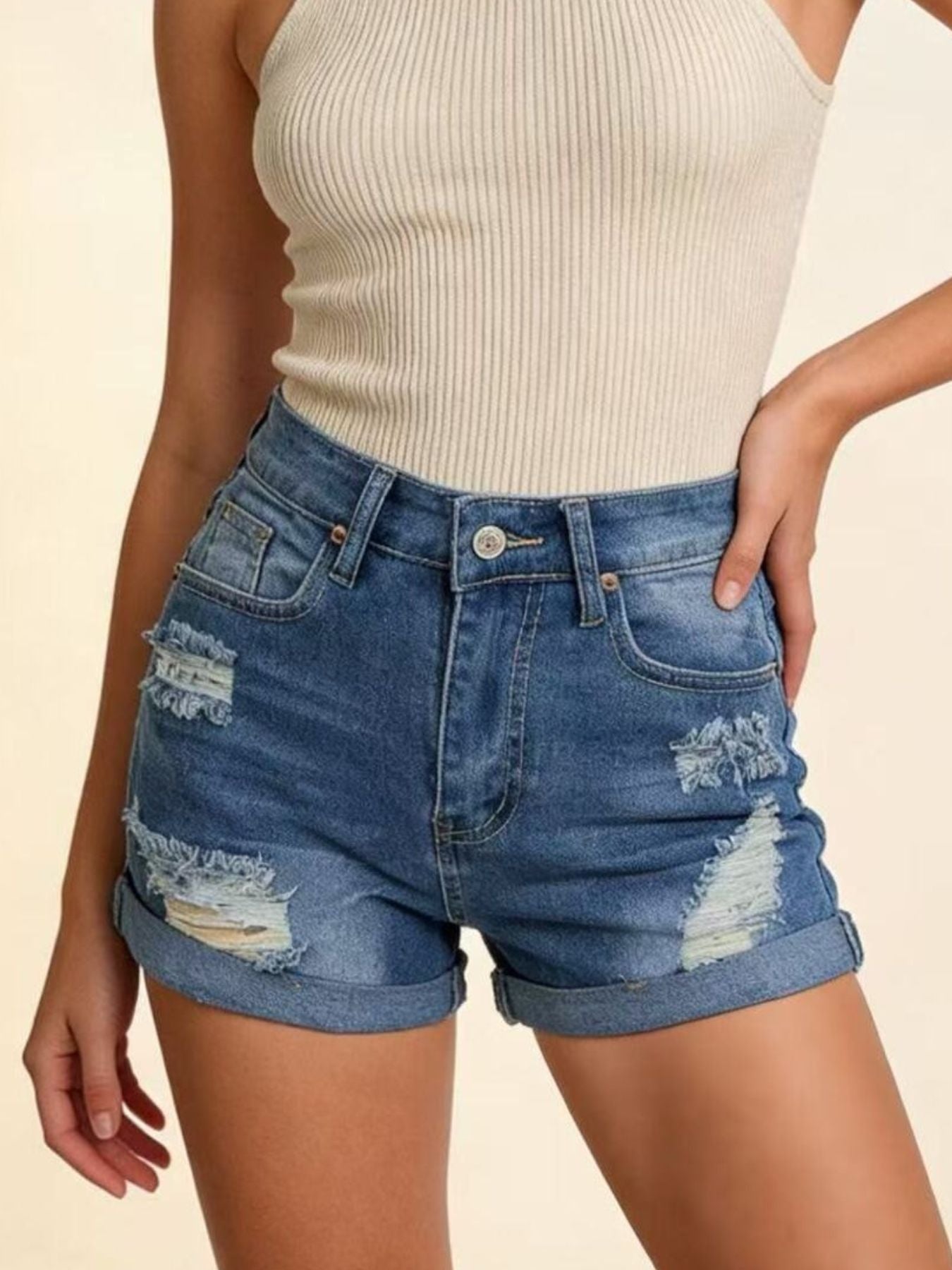 Daverri Distressed High-Waisted Denim Shorts with frayed patches and rolled cuffs