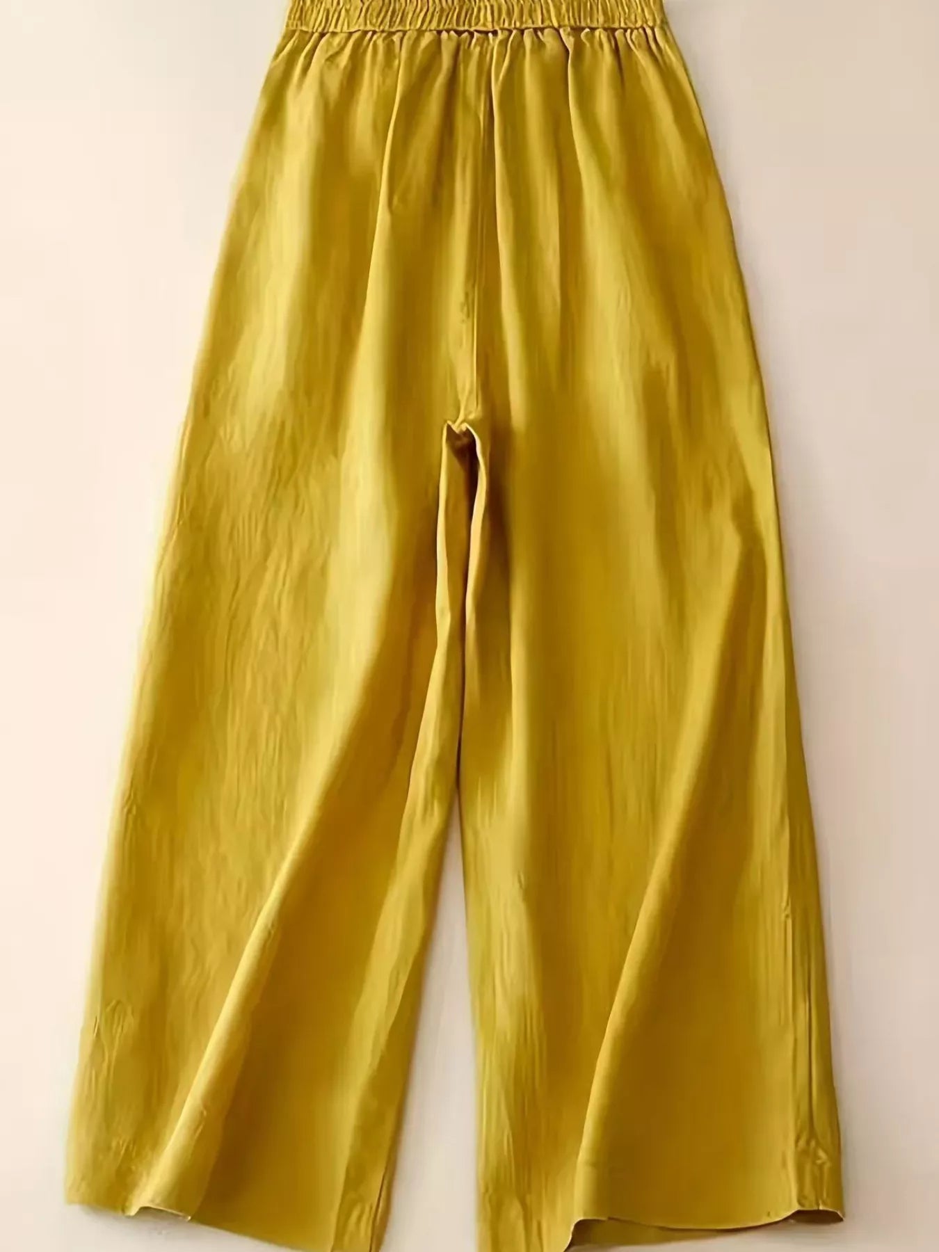 Daverri wide-leg button-decorated pants in golden-yellow flowing fabric