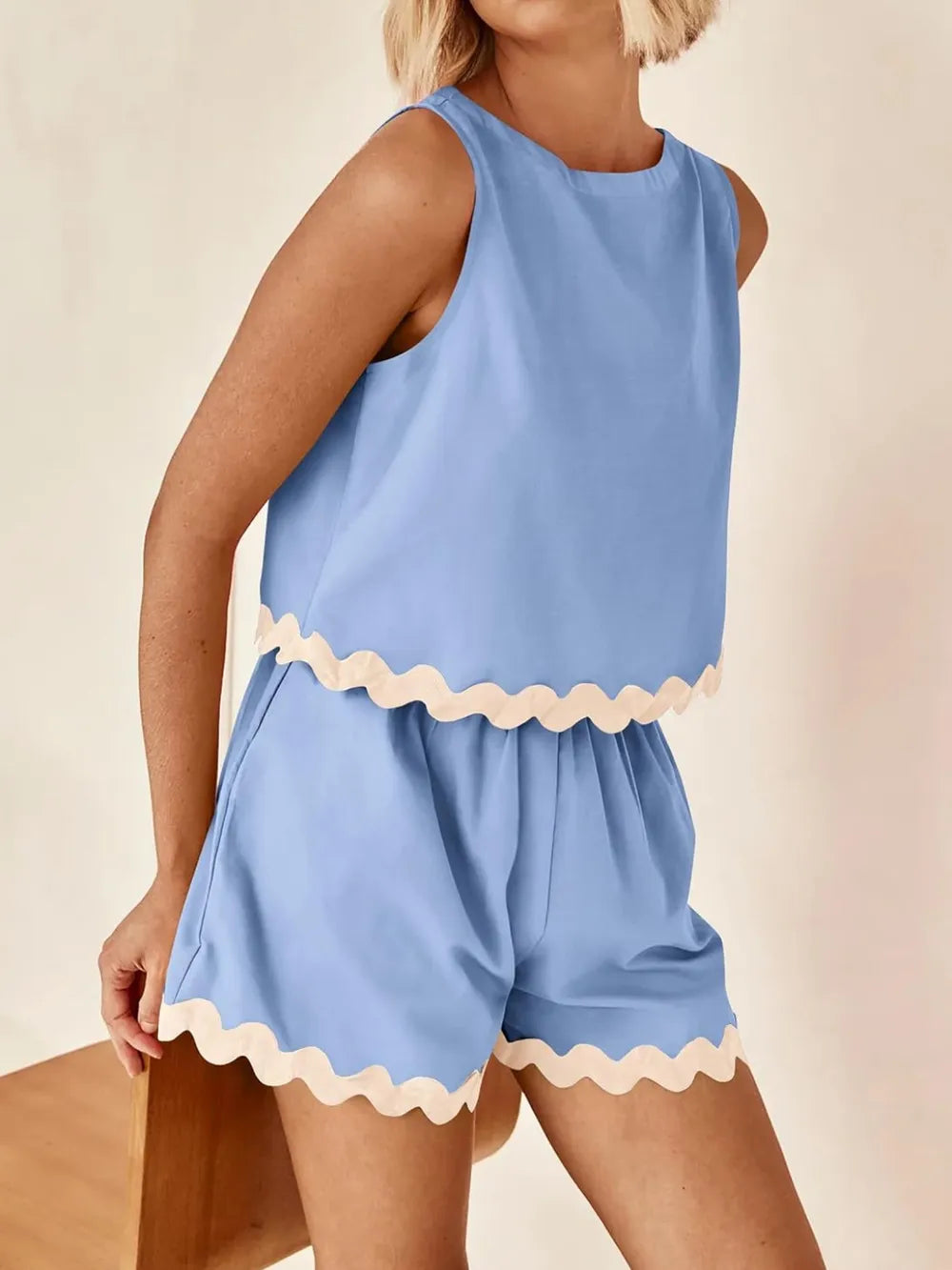 Daverri Fashions light blue sleeveless top and shorts set with cream trim