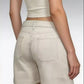 Daverri pocketed denim shorts in beige with rolled cuffs and back pockets