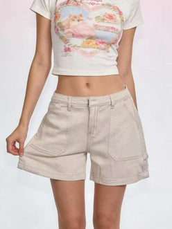 Daverri pocketed denim shorts in beige with rolled cuffs and front pockets