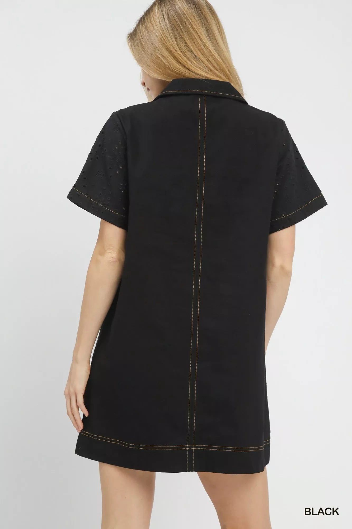 Black Umgee eyelet short sleeve shift dress with pocket and yellow stitching