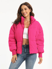 Hot pink zip-up turtleneck puffer jacket with hood