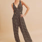 Aemi + Co Ditsy Floral Surplice Sleeveless Wide Leg Jumpsuit Black Jumpsuits