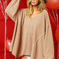 Cozy camel waffle-knit oversized BiBi V-neck sweater with uneven hem