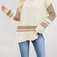Cream-colored Color Block Side Slit Sweater with striped accents