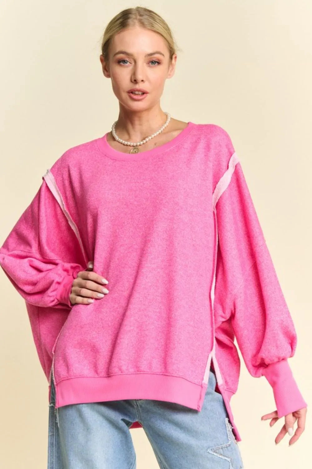 Vibrant pink Davi & Dani oversized knit top with white trim, size M