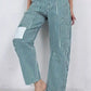 Daverri Striped Wide-Leg Pants in teal and white vertical stripes