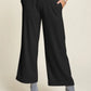 Davi & Dani black wide-leg mid-rise pants in flowing fabric with side pockets