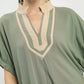 Umgee mint linen cotton blend V-neck blouse with beige contrast trim