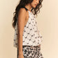 White halter-neck blouse top with black bow ribbon checker print by Davi & Dani