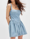 Daverri smocked crisscross back light blue denim mini dress