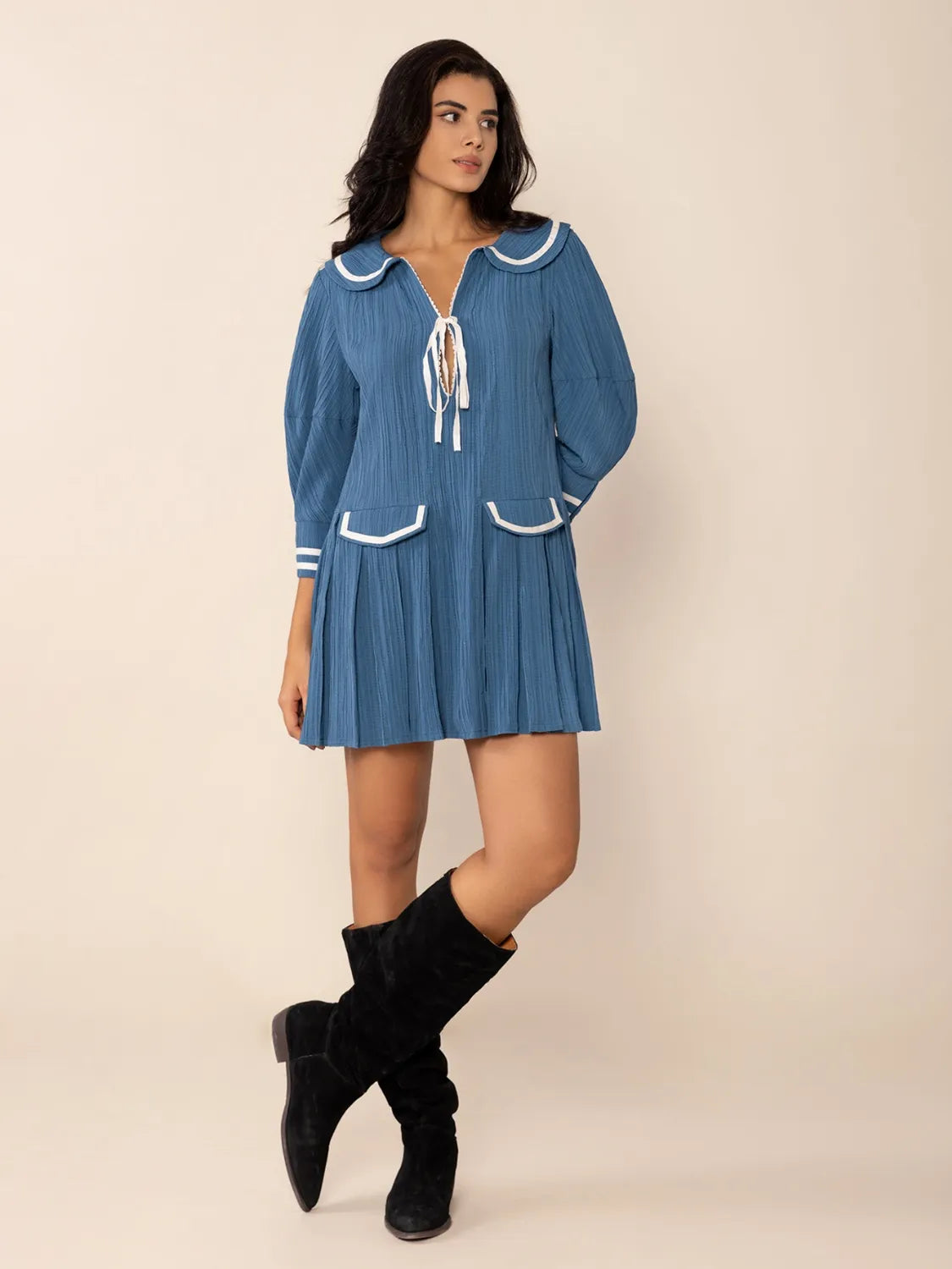 Blue pleated mini dress with Peter Pan collar and tie front