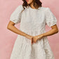 White textured lace SO ME floral jacquard diagonal tiered short mini dress with puffed sleeves