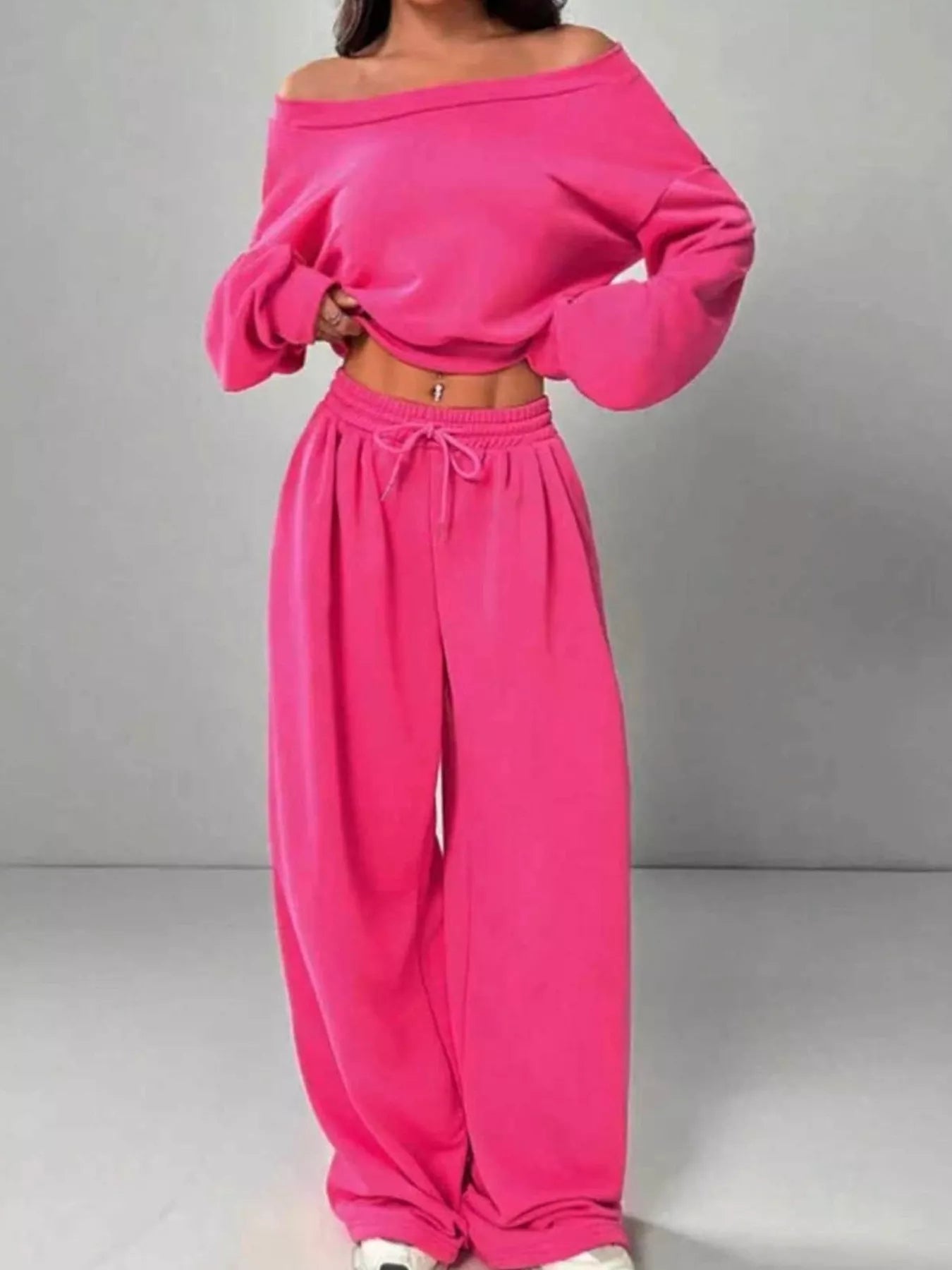 Vibrant pink boat neck cropped sweatshirt and wide-leg joggers set