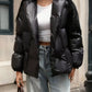 Black shiny Daverri belted long sleeve puffer jacket with quilted hood