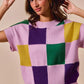 Vibrant SO ME Mardi Gras plaid sweater top in bold lavender, purple, green, yellow patchwork