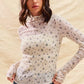 SO ME floral print textured long sleeve knit top in ivory with black pattern