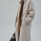 Cream-colored plus size sherpa teddy coat with leather accents