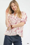 Woman in Umgee Mixed Print Puff Sleeve Split Neck Top with floral blouse