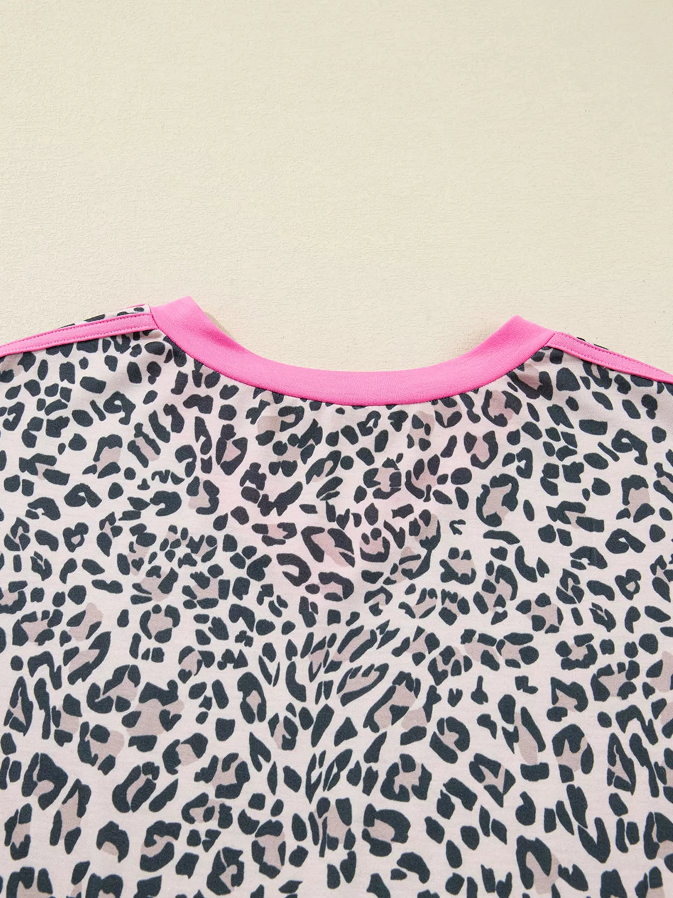 Women’s pink black leopard print V-neck long sleeve varsity top