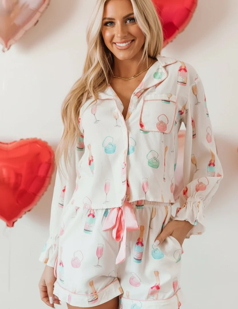 White and pink flamingo pajama set with ruffles, polka dots, bow print
