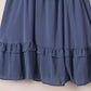 Tie-front mini dress in soft blue with tiered ruffle hem and elastic waistband