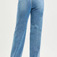RISEN Slouchy Straight Jeans in light-wash blue wide-leg denim with back pockets