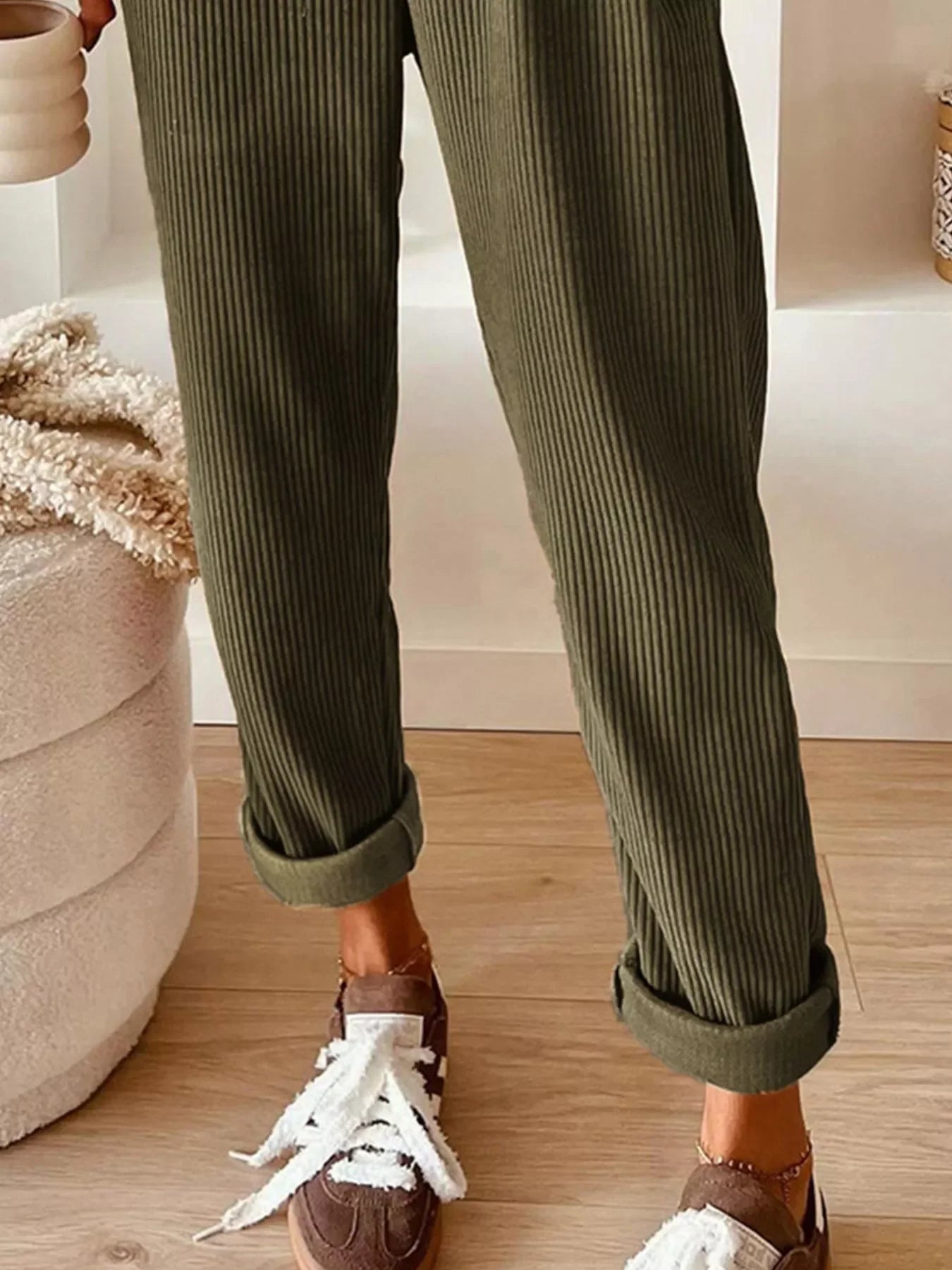Olive green corduroy trousers with rolled cuffs by Daverri Fashions
