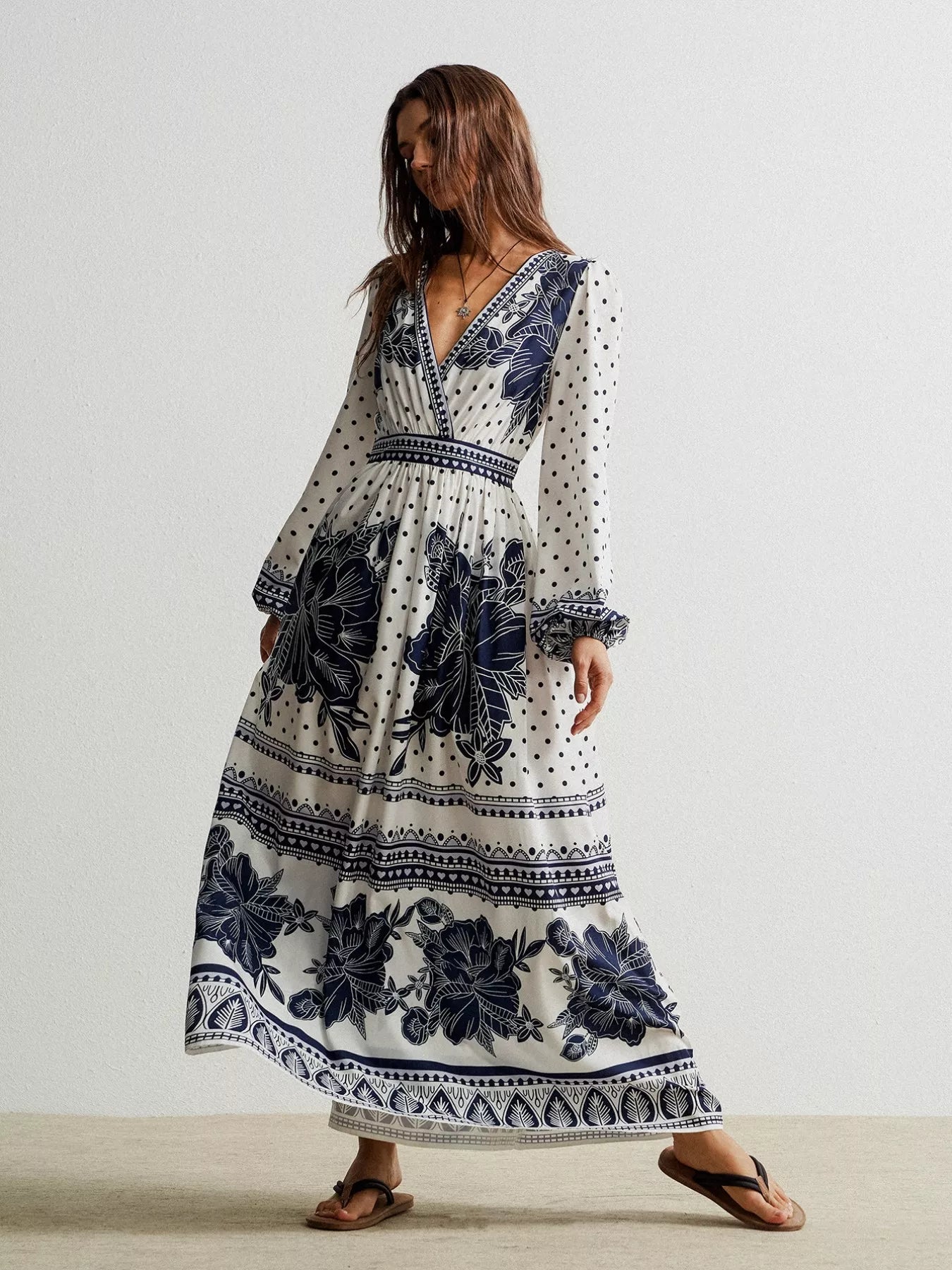 Floral print long sleeve maxi dress in white with navy blue patterns