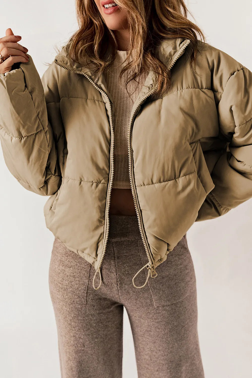 Khaki zip-up puffer jacket with hood and collar for winter warmth