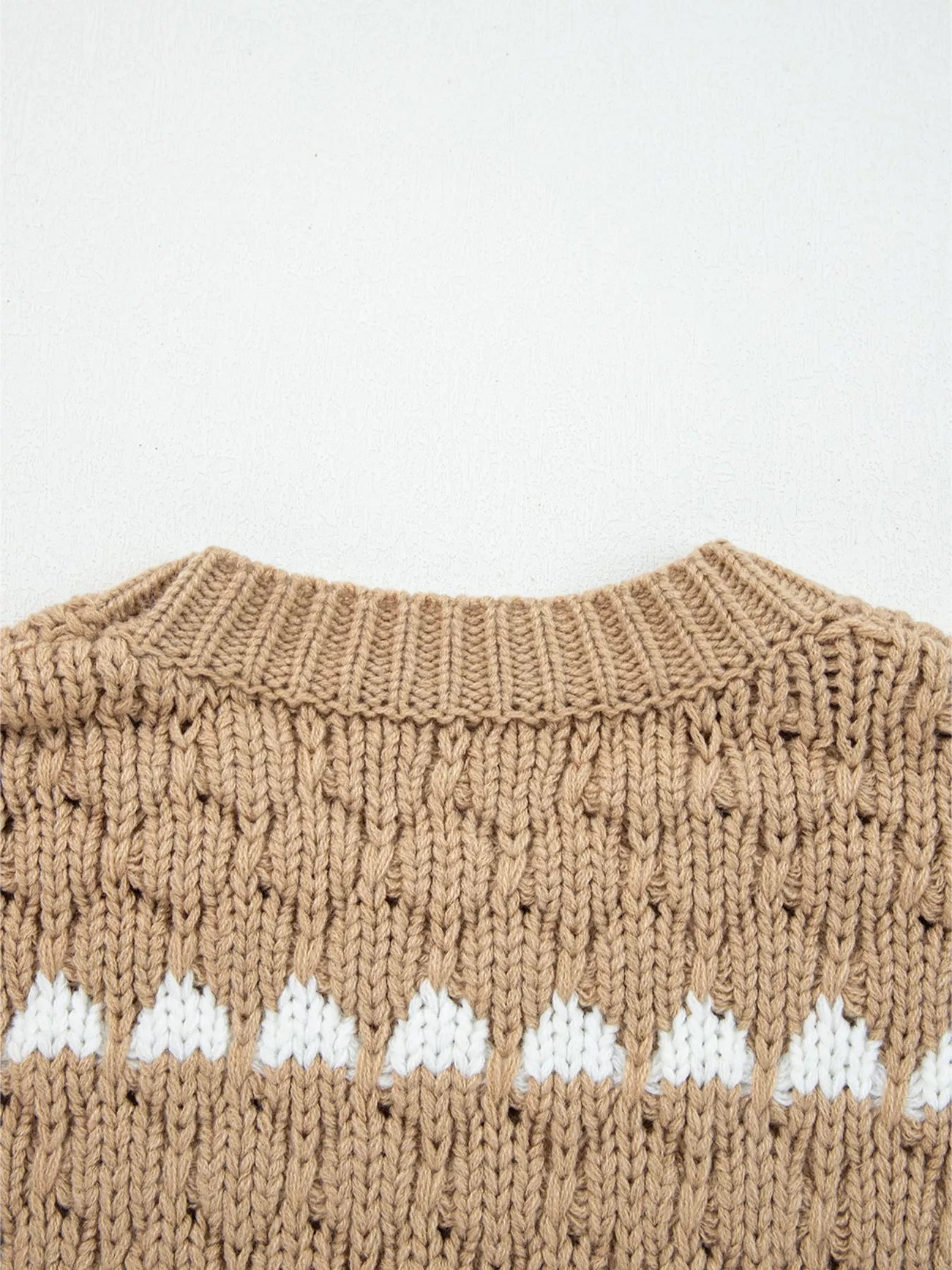 Women’s beige textured knit puff sleeve baggy sweater with white triangle patterns