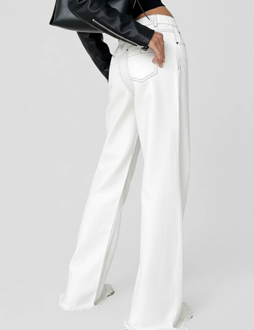 White high-waisted wide-leg jeans with relaxed fit and button fly