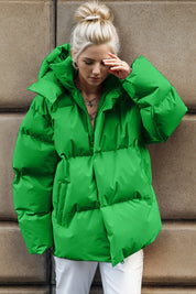 Green pocketed zip-up hooded puffer jacket with quilted design