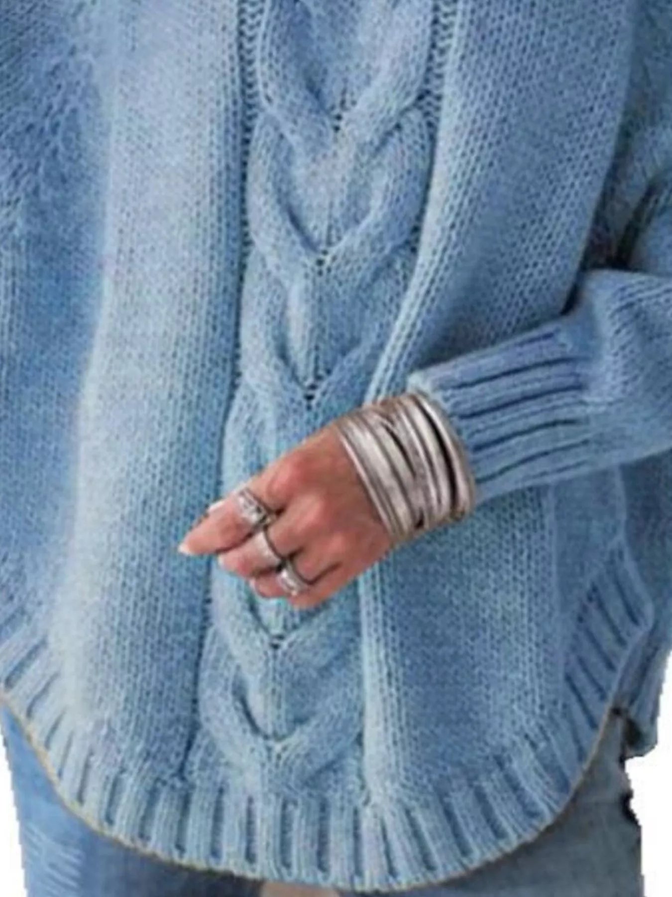 Light blue full-size cable-knit long sleeve sweater with ribbed cuffs