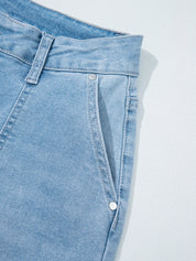 High-rise light blue barrel relaxed patch pocket jeans with button fly