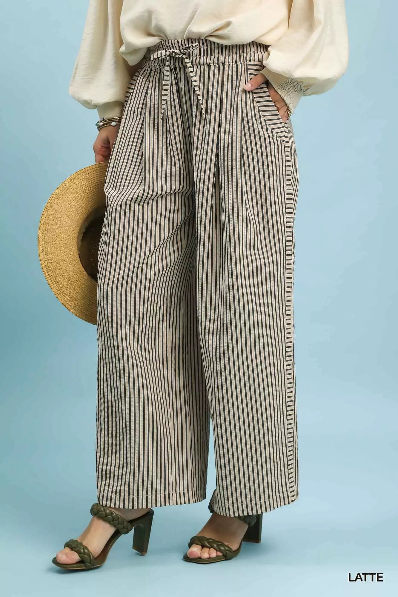 Umgee Drawstring Striped Wide-Leg Pants in beige and black vertical stripes