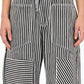 Daverri Striped Wide-Leg Pants in black and white vertical stripes