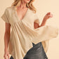 Aemi + Co Tuck Detail V-Neck Short Sleeve Blouse Blouses