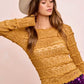 Mustard yellow textured sweater with ruffled crew neck details