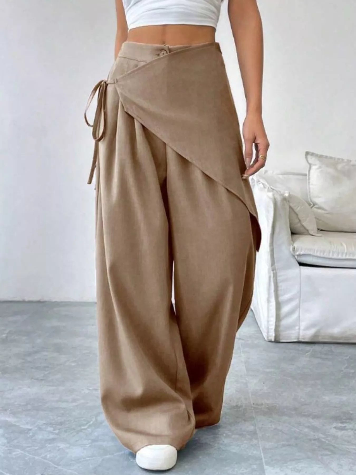 Daverri wrap-front wide-leg pants in beige with draped asymmetrical design