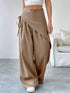 Daverri wrap-front wide-leg pants in beige with draped asymmetrical design