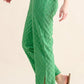 Green textured checkerboard pants with side slit and ruffled top